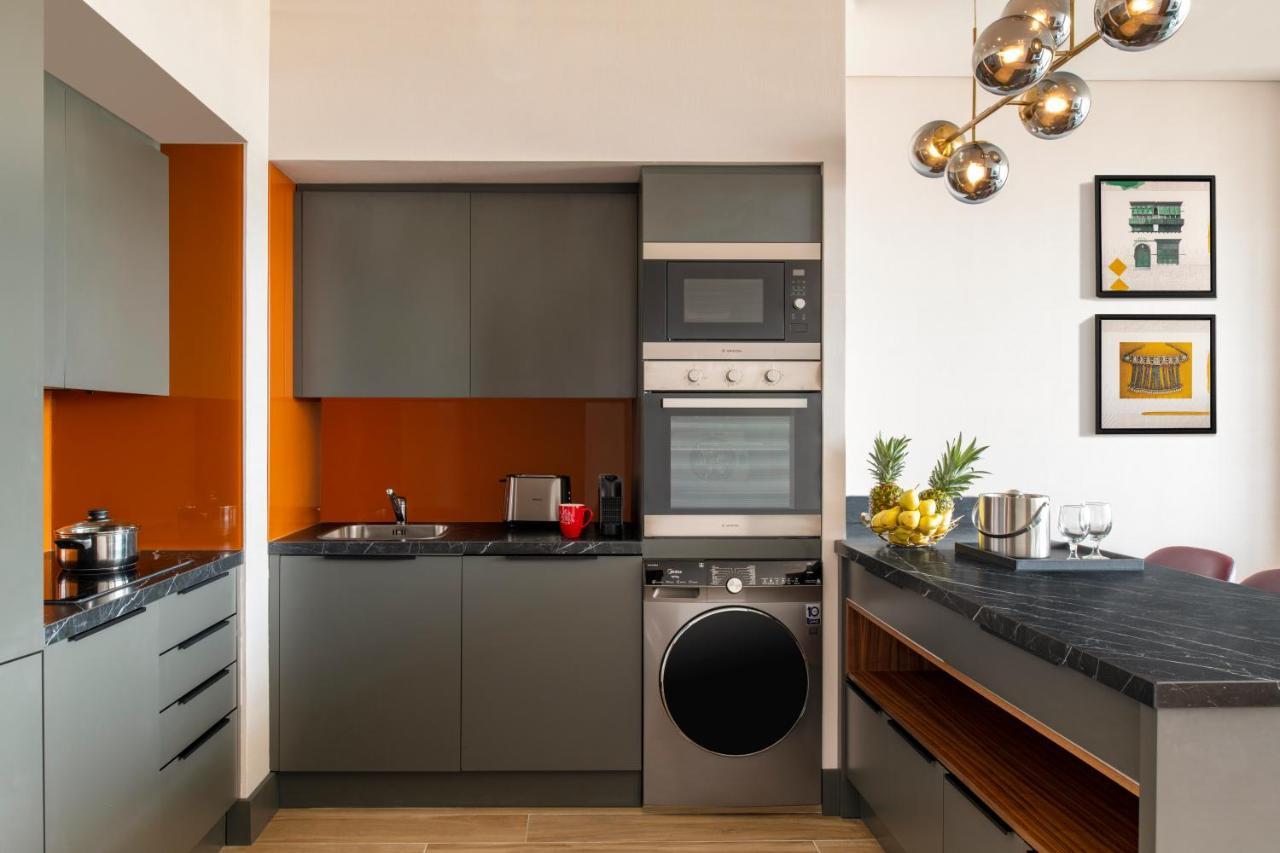 Swissotel Living Jiddah Esterno foto A typical kitchen in a serviced apartment
